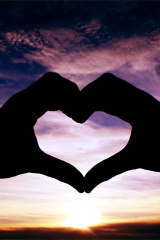 IPHONE tapety - Heart-hand-wallpaper.jpg